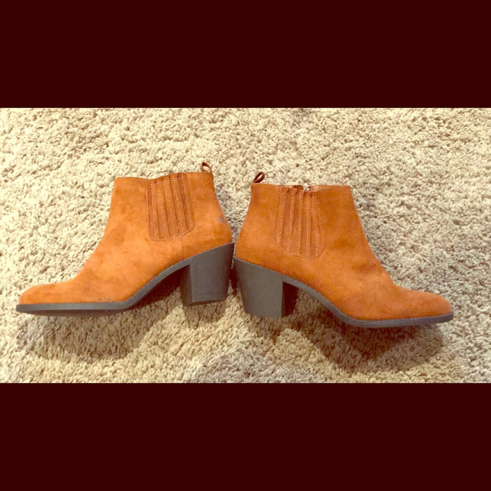 Brown suede low booties.